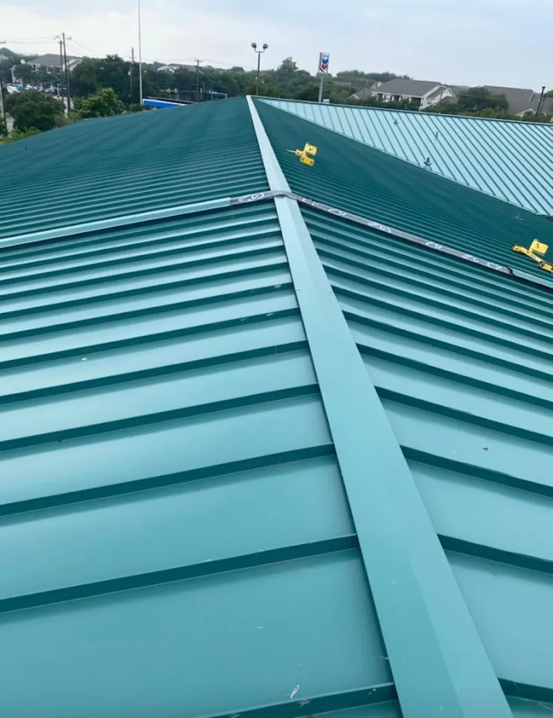 Green commercial metal roof ridge and valley for Metal Roof Repair in Fairfield Glade